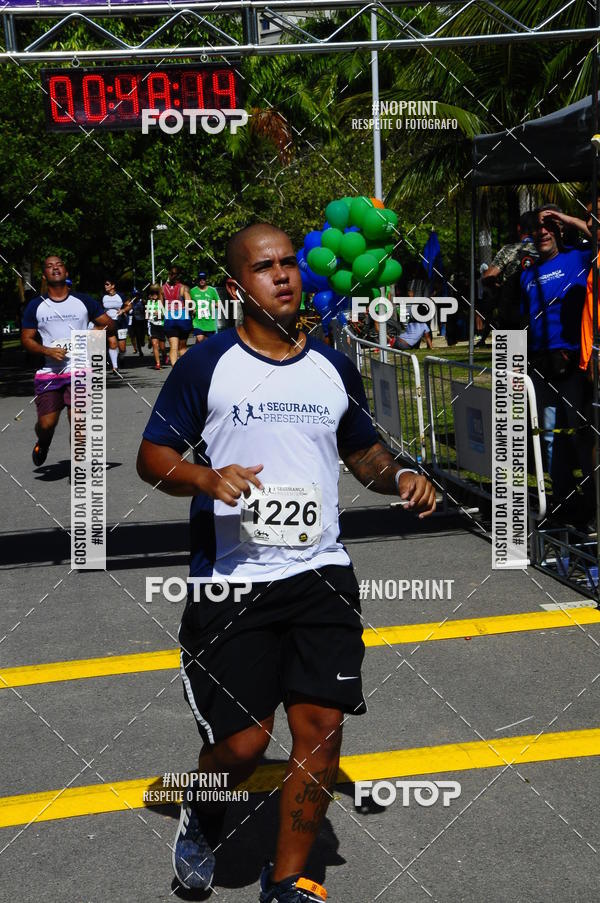 Buy your photos of the event4 Segurana Presente Run on Fotop