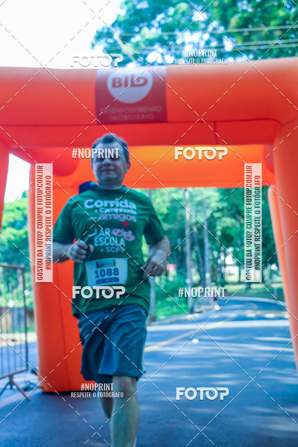 Compra tus fotos del evento5a Corrida e Caminhada dos Amigos Lar EScola En Fotop