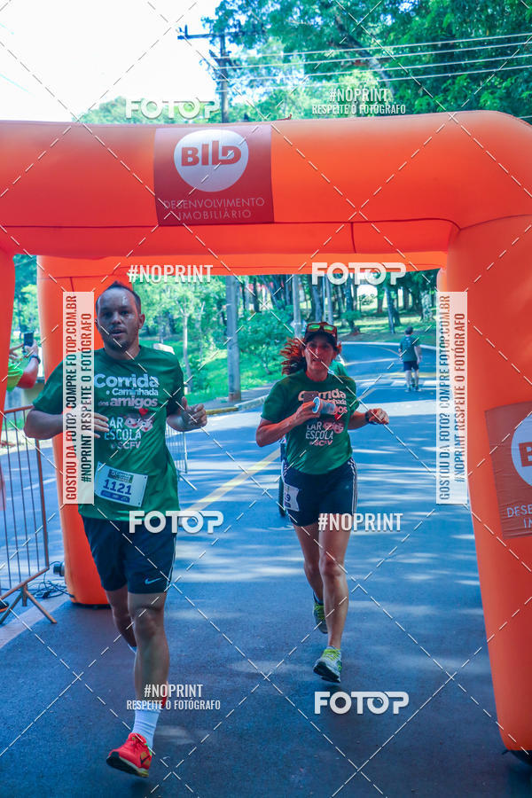 Compre as suas fotos do evento5a Corrida e Caminhada dos Amigos Lar EScola no Fotop
