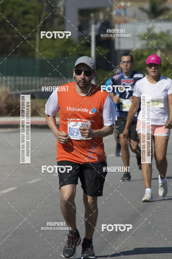 Buy your photos of the eventCorrida Solidria Grupo Milclean 21 anos on Fotop