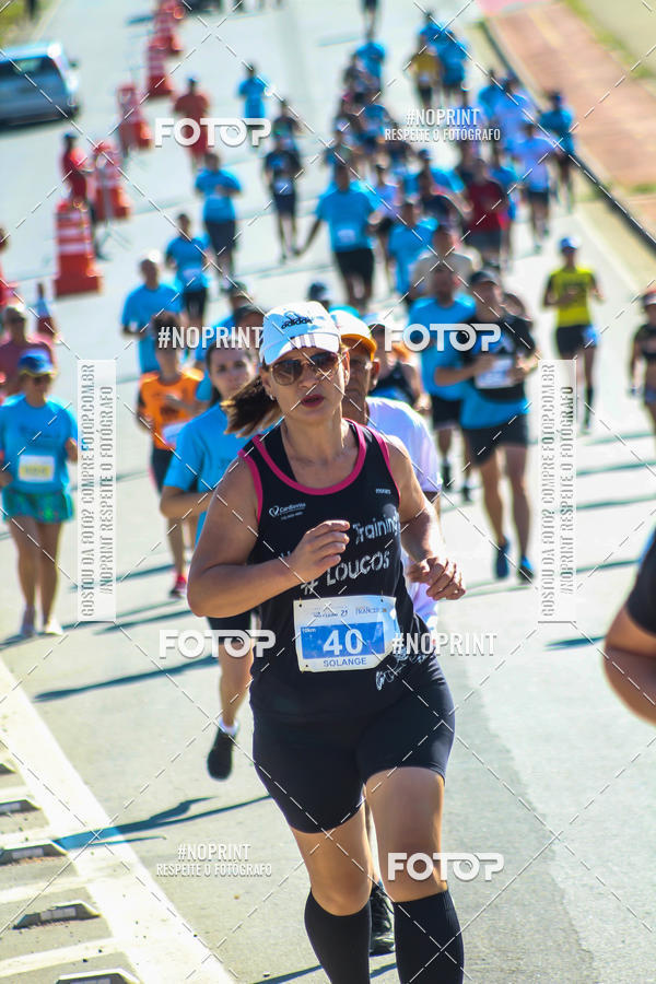 Compre suas fotos do eventoCorrida Solidria Grupo Milclean 21 anos no Fotop