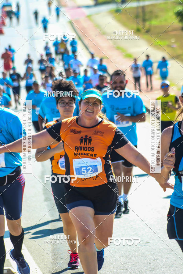 Compre suas fotos do eventoCorrida Solidria Grupo Milclean 21 anos no Fotop