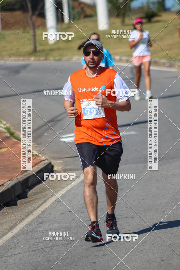 Compra tus fotos del eventoCorrida Solidria Grupo Milclean 21 anos En Fotop