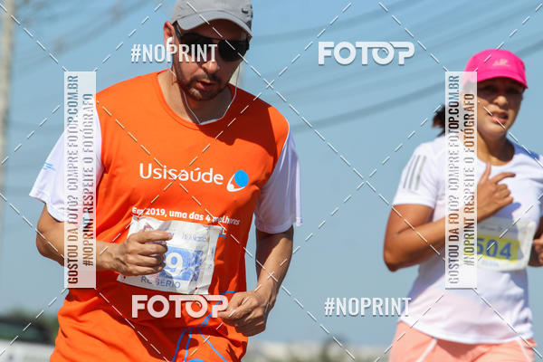 Compra tus fotos del eventoCorrida Solidria Grupo Milclean 21 anos En Fotop