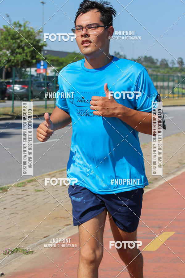 Buy your photos of the eventCorrida Solidria Grupo Milclean 21 anos on Fotop