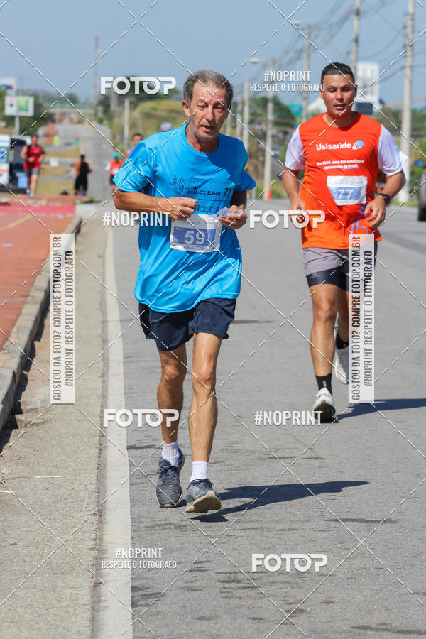 Buy your photos of the eventCorrida Solidria Grupo Milclean 21 anos on Fotop