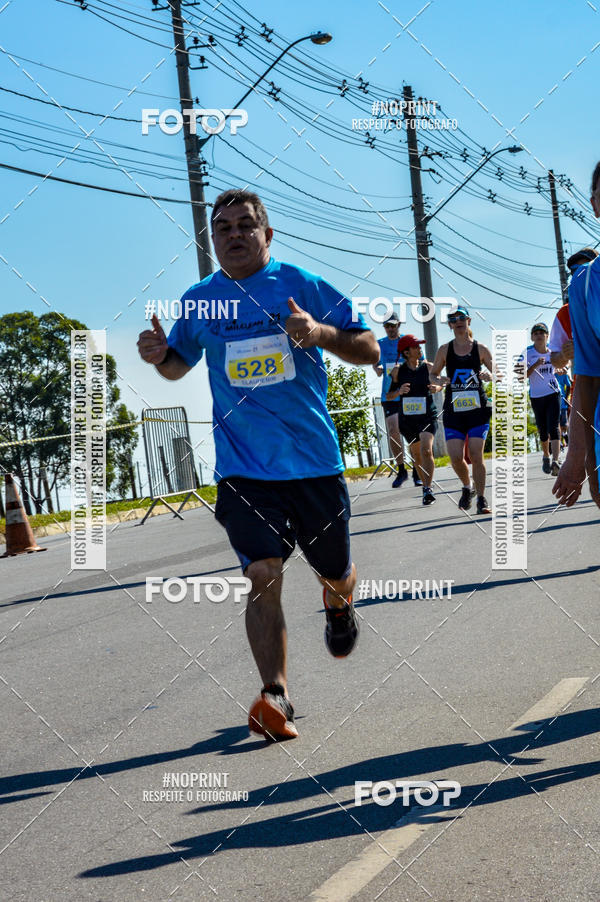 Buy your photos of the eventCorrida Solidria Grupo Milclean 21 anos on Fotop