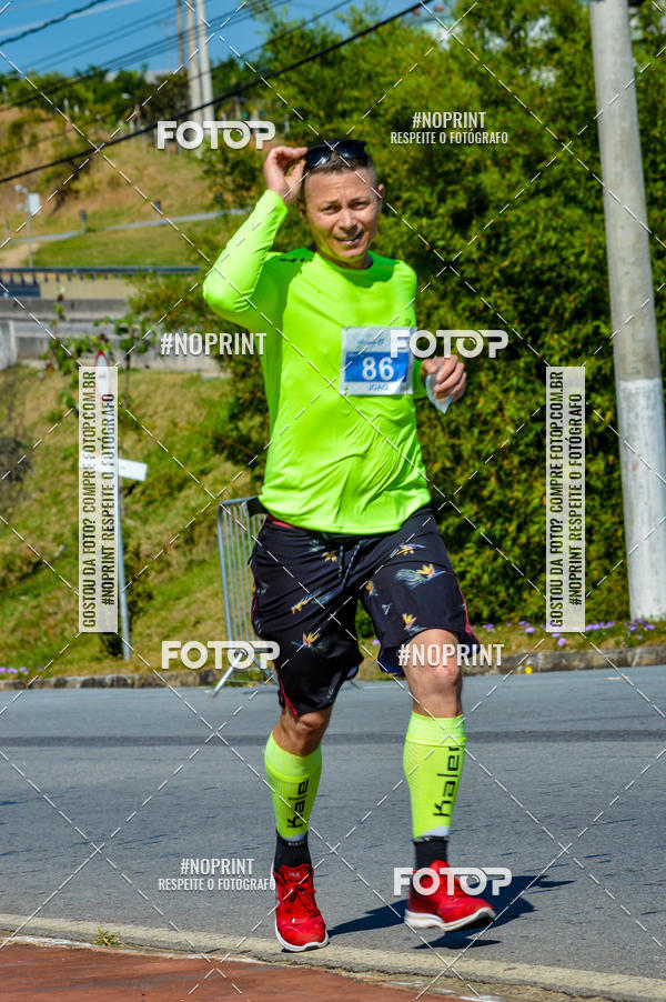 Compra tus fotos del eventoCorrida Solidria Grupo Milclean 21 anos En Fotop