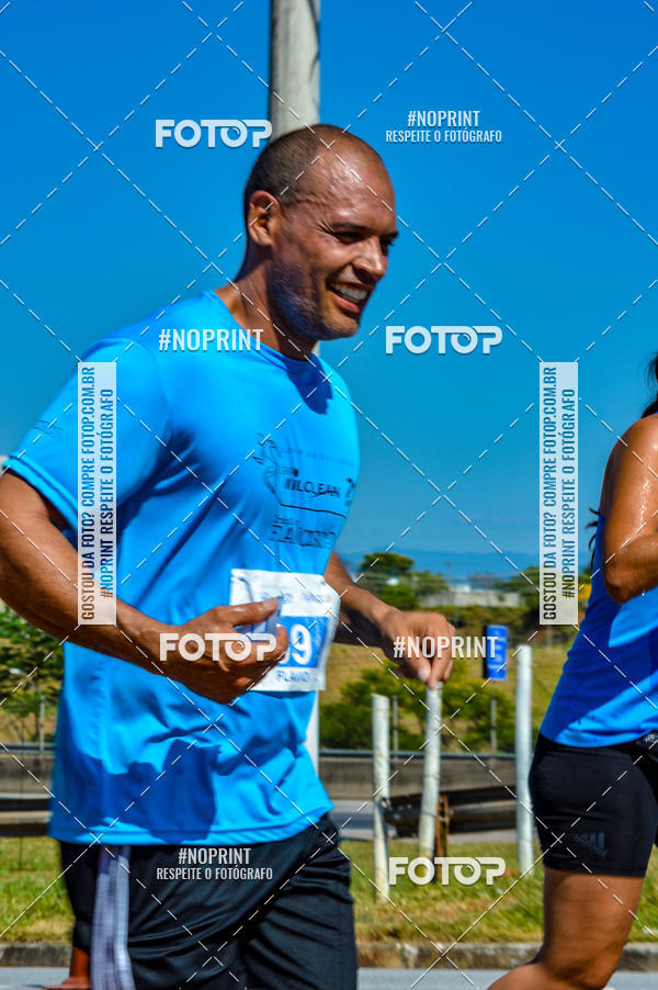 Compra tus fotos del eventoCorrida Solidria Grupo Milclean 21 anos En Fotop