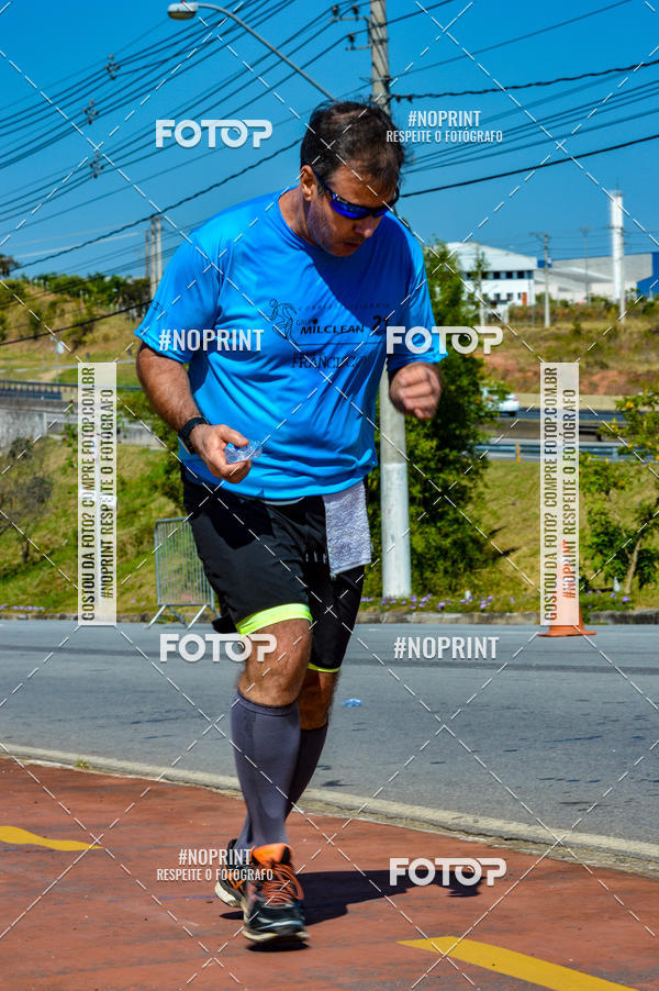 Compra tus fotos del eventoCorrida Solidria Grupo Milclean 21 anos En Fotop