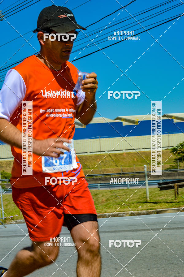 Compra tus fotos del eventoCorrida Solidria Grupo Milclean 21 anos En Fotop