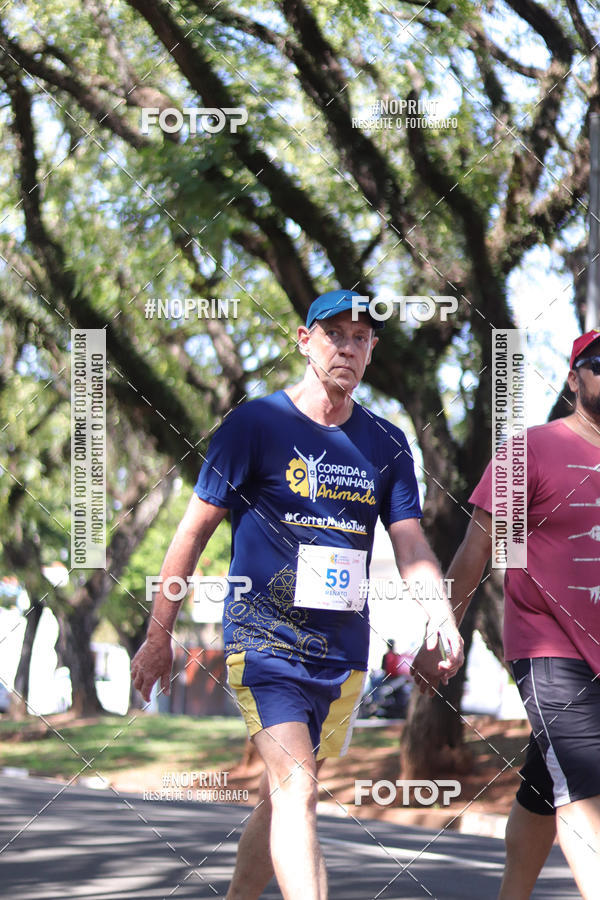 Buy your photos of the event9 Corrida e Caminhada Animada Hospitalhaos on Fotop