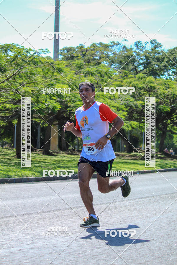 Buy your photos of the event31 Corrida e Caminhada dos Engenheiros e Arquitetos on Fotop