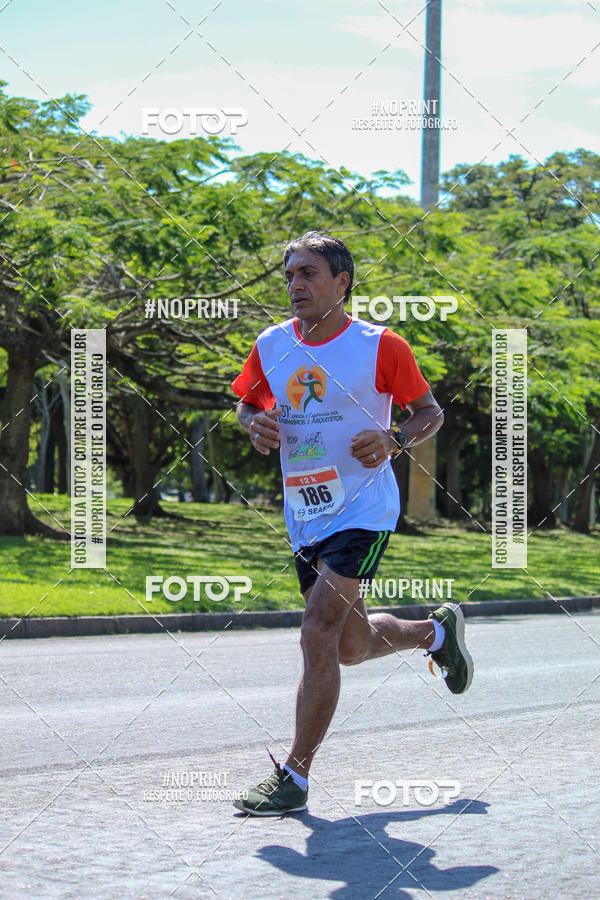 Buy your photos of the event31 Corrida e Caminhada dos Engenheiros e Arquitetos on Fotop