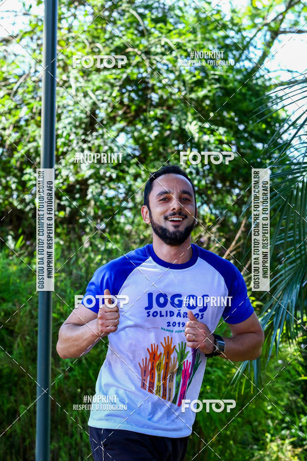 Compra tus fotos del eventoJOGOS SOLIDRIOS - Poos de Caldas MG En Fotop