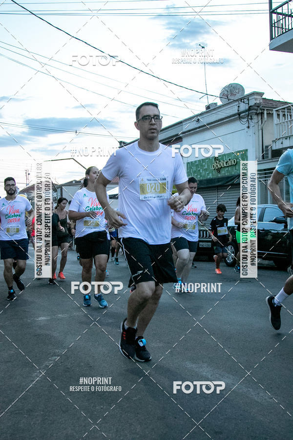 Buy your photos of the event64� Corrida da Virada 2019 on Fotop