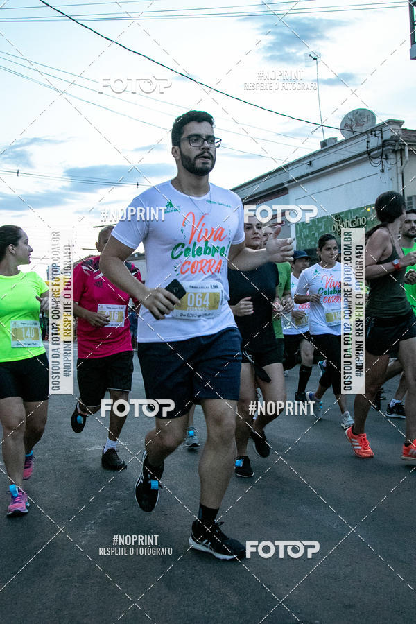 Buy your photos of the event64� Corrida da Virada 2019 on Fotop
