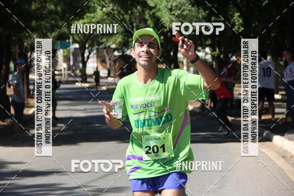 Compre suas fotos do evento1� Corrida Unimed Norte de Minas no Fotop