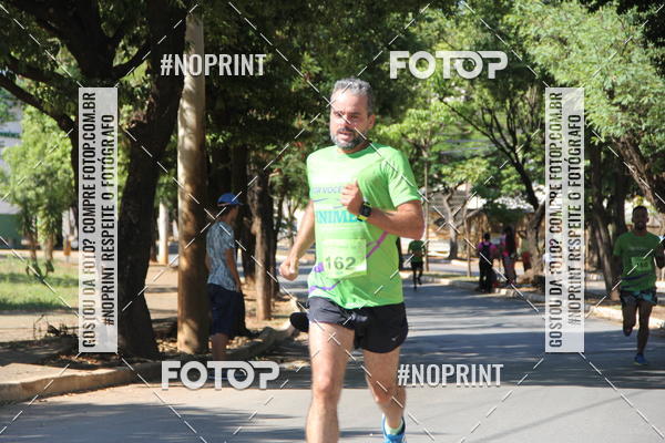 Compre suas fotos do evento1� Corrida Unimed Norte de Minas no Fotop
