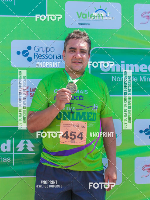 Buy your photos of the event1 Corrida Unimed Norte de Minas on Fotop