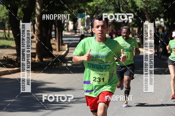 Compre suas fotos do evento1� Corrida Unimed Norte de Minas no Fotop