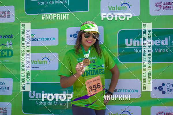 Buy your photos of the event1 Corrida Unimed Norte de Minas on Fotop