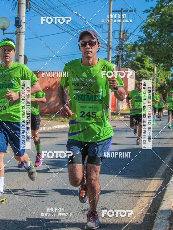 Buy your photos of the event1 Corrida Unimed Norte de Minas on Fotop