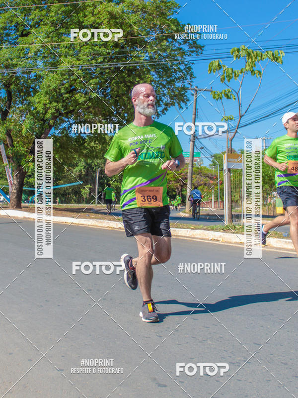 Compre suas fotos do evento1� Corrida Unimed Norte de Minas no Fotop