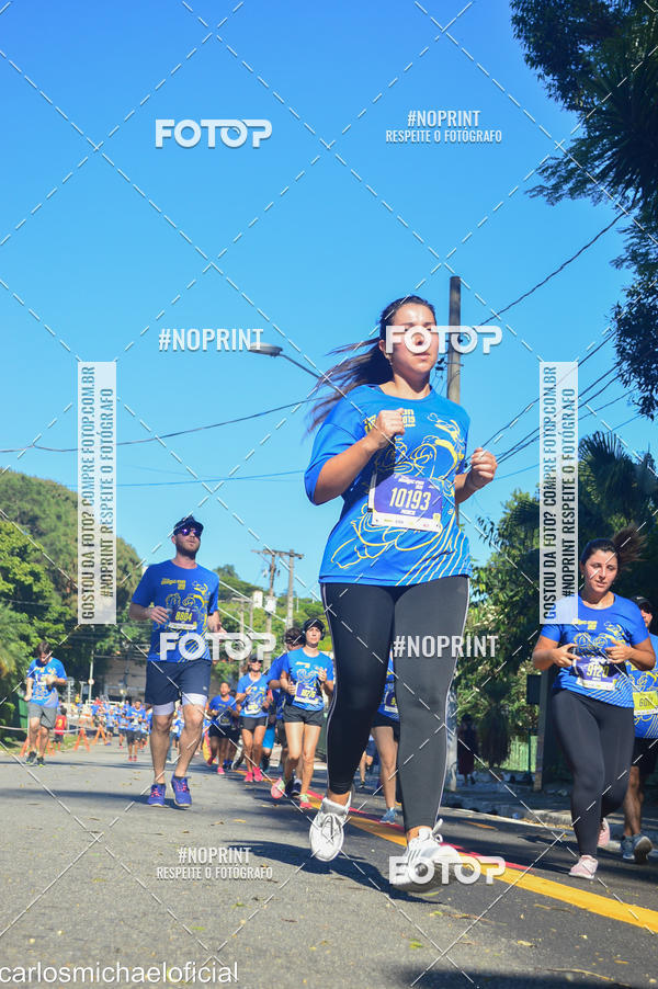 Buy your photos of the eventDisney Magic Run SP - Equipe ASI on Fotop