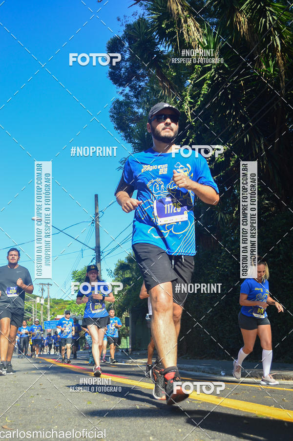 Buy your photos of the eventDisney Magic Run SP - Equipe ASI on Fotop