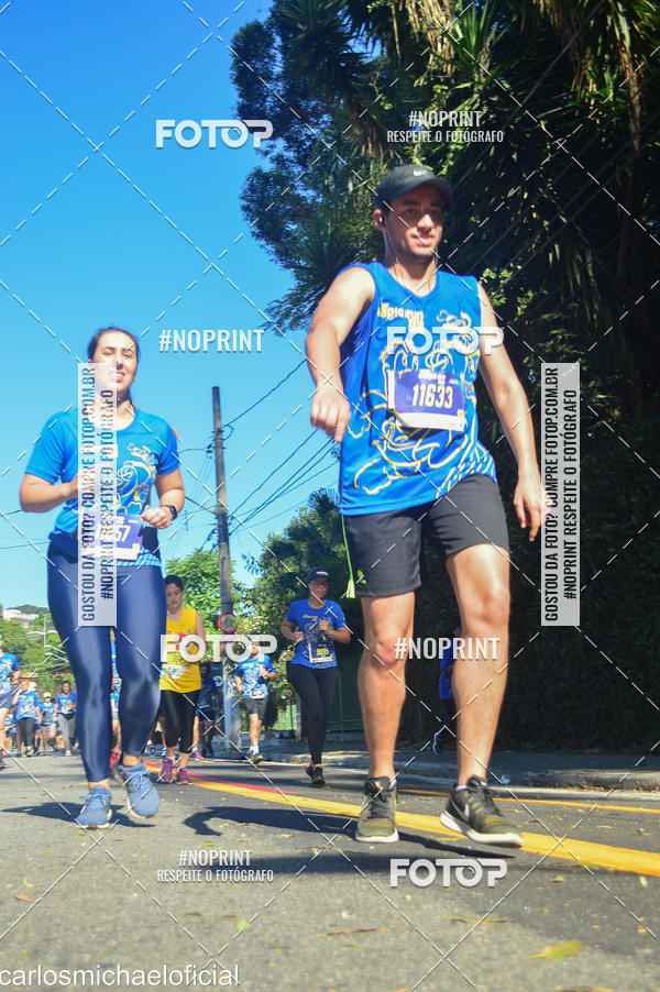 Buy your photos of the eventDisney Magic Run SP - Equipe ASI on Fotop