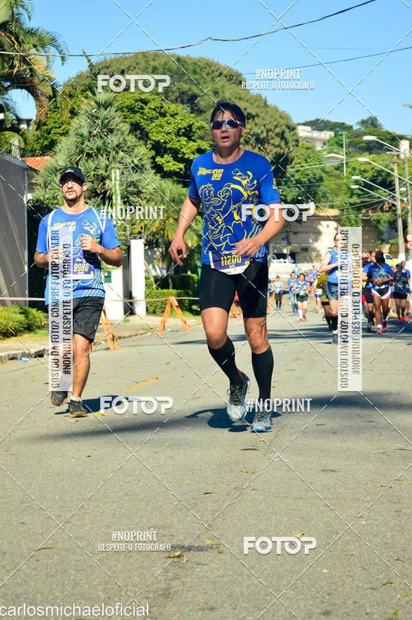 Buy your photos of the eventDisney Magic Run SP - Equipe ASI on Fotop