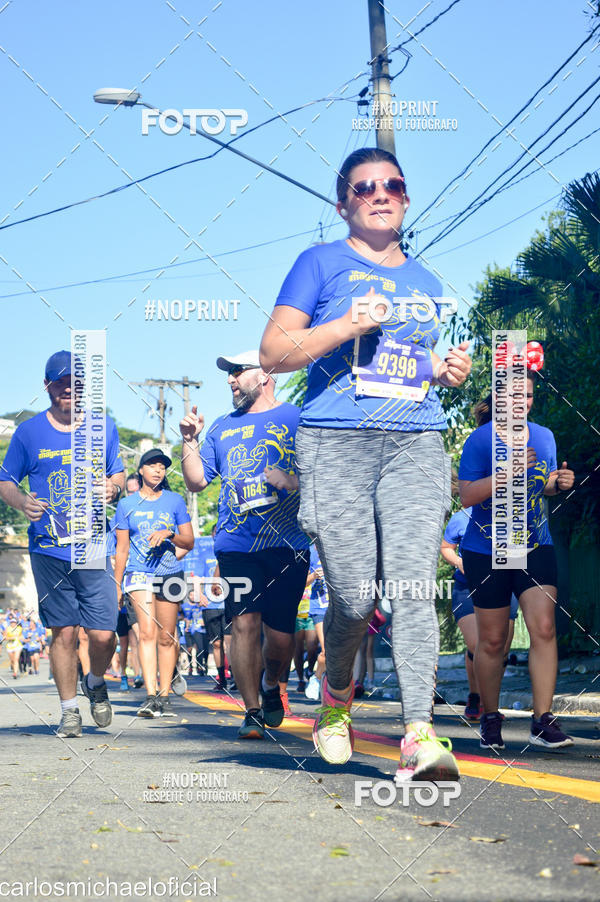 Buy your photos of the eventDisney Magic Run SP - Equipe ASI on Fotop