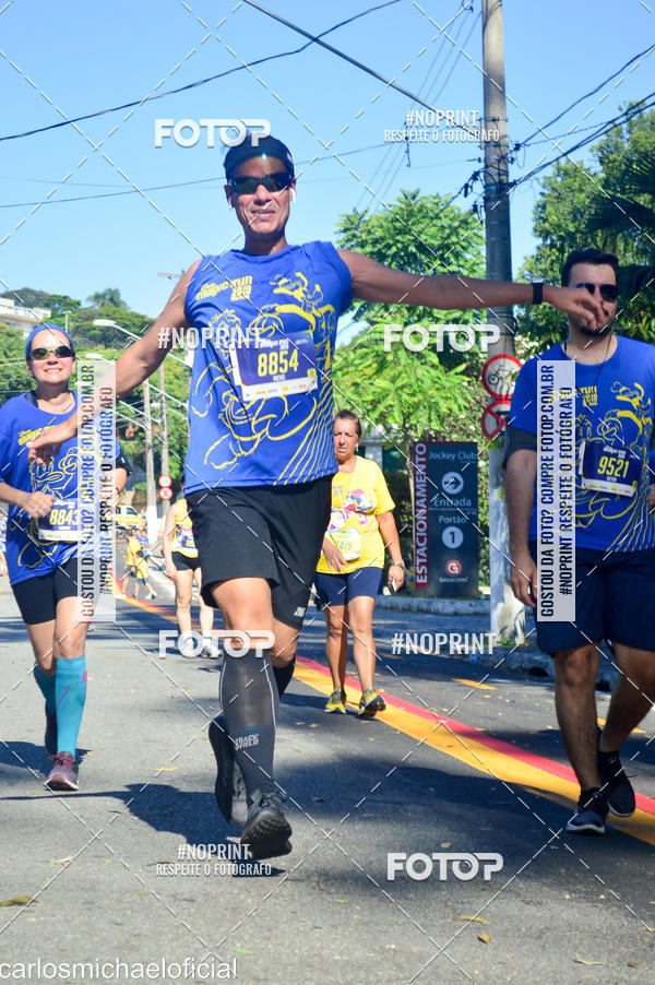 Buy your photos of the eventDisney Magic Run SP - Equipe ASI on Fotop