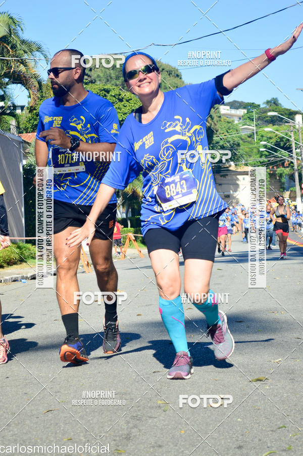 Buy your photos of the eventDisney Magic Run SP - Equipe ASI on Fotop