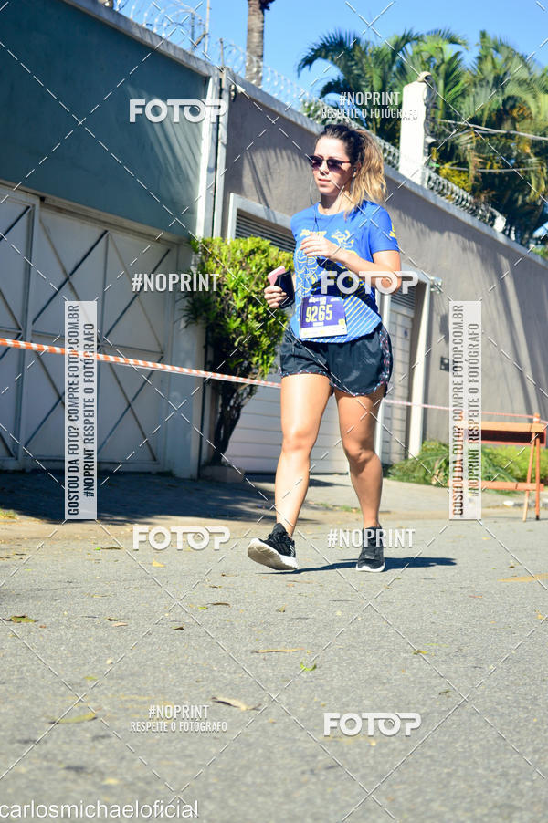 Buy your photos of the eventDisney Magic Run SP - Equipe ASI on Fotop