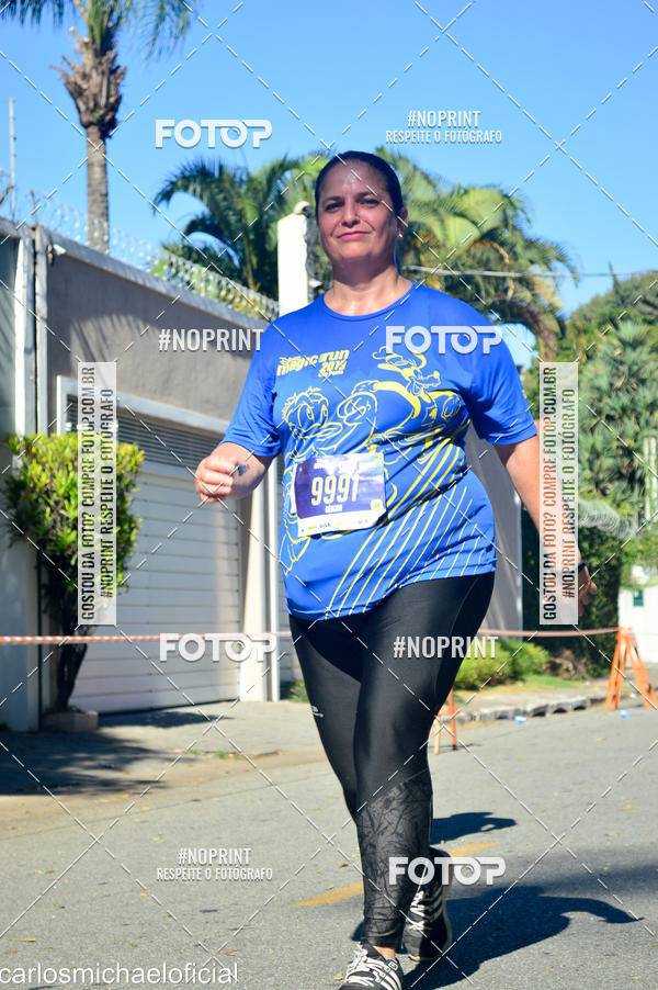 Buy your photos of the eventDisney Magic Run SP - Equipe ASI on Fotop