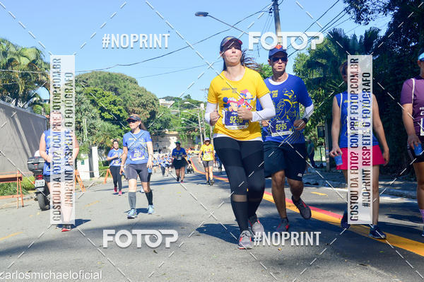 Buy your photos of the eventDisney Magic Run SP - Equipe ASI on Fotop