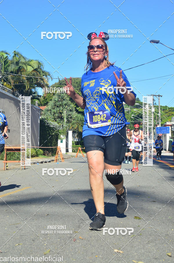 Buy your photos of the eventDisney Magic Run SP - Equipe ASI on Fotop