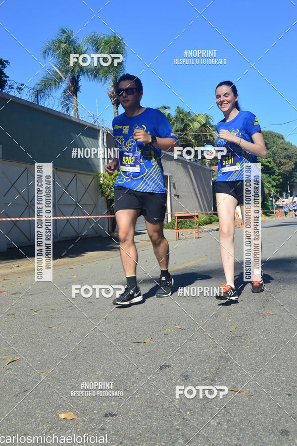 Buy your photos of the eventDisney Magic Run SP - Equipe ASI on Fotop