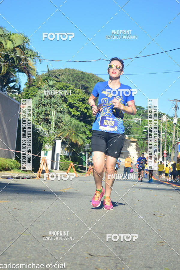 Buy your photos of the eventDisney Magic Run SP - Equipe ASI on Fotop