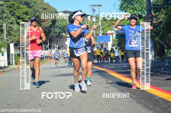 Buy your photos of the eventDisney Magic Run SP - Equipe ASI on Fotop