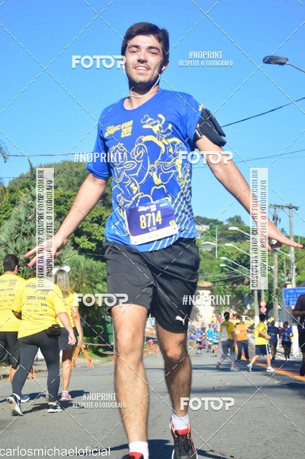 Buy your photos of the eventDisney Magic Run SP - Equipe ASI on Fotop