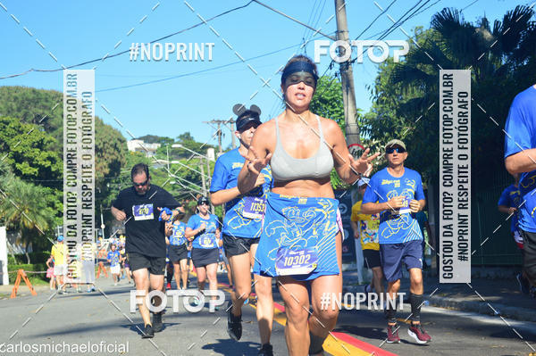 Buy your photos of the eventDisney Magic Run SP - Equipe ASI on Fotop