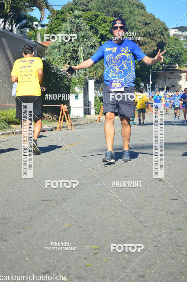 Buy your photos of the eventDisney Magic Run SP - Equipe ASI on Fotop