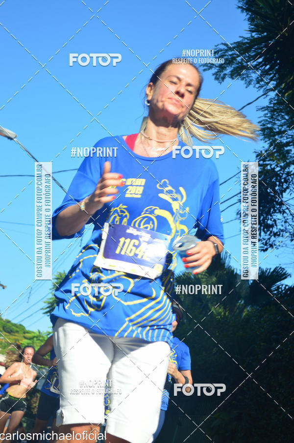 Buy your photos of the eventDisney Magic Run SP - Equipe ASI on Fotop