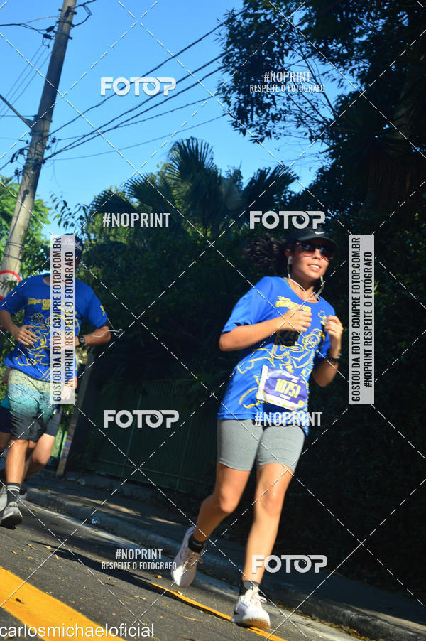 Buy your photos of the eventDisney Magic Run SP - Equipe ASI on Fotop
