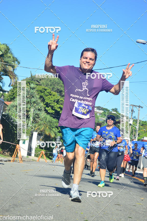 Buy your photos of the eventDisney Magic Run SP - Equipe ASI on Fotop