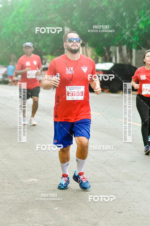 Compra tus fotos del eventoTrplice Corrida do Fortaleza En Fotop