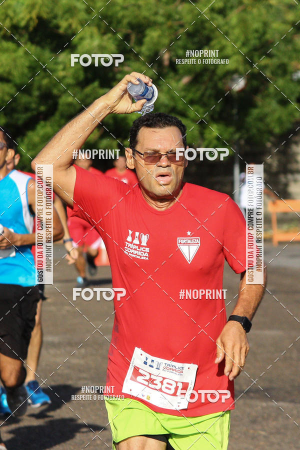 Compre suas fotos do eventoTrplice Corrida do Fortaleza no Fotop